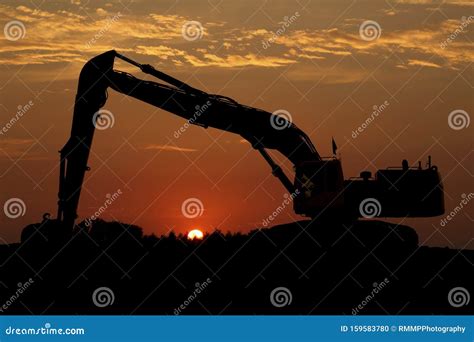 mini excavator sunset|629 Excavator Sunset Stock Photos and High.